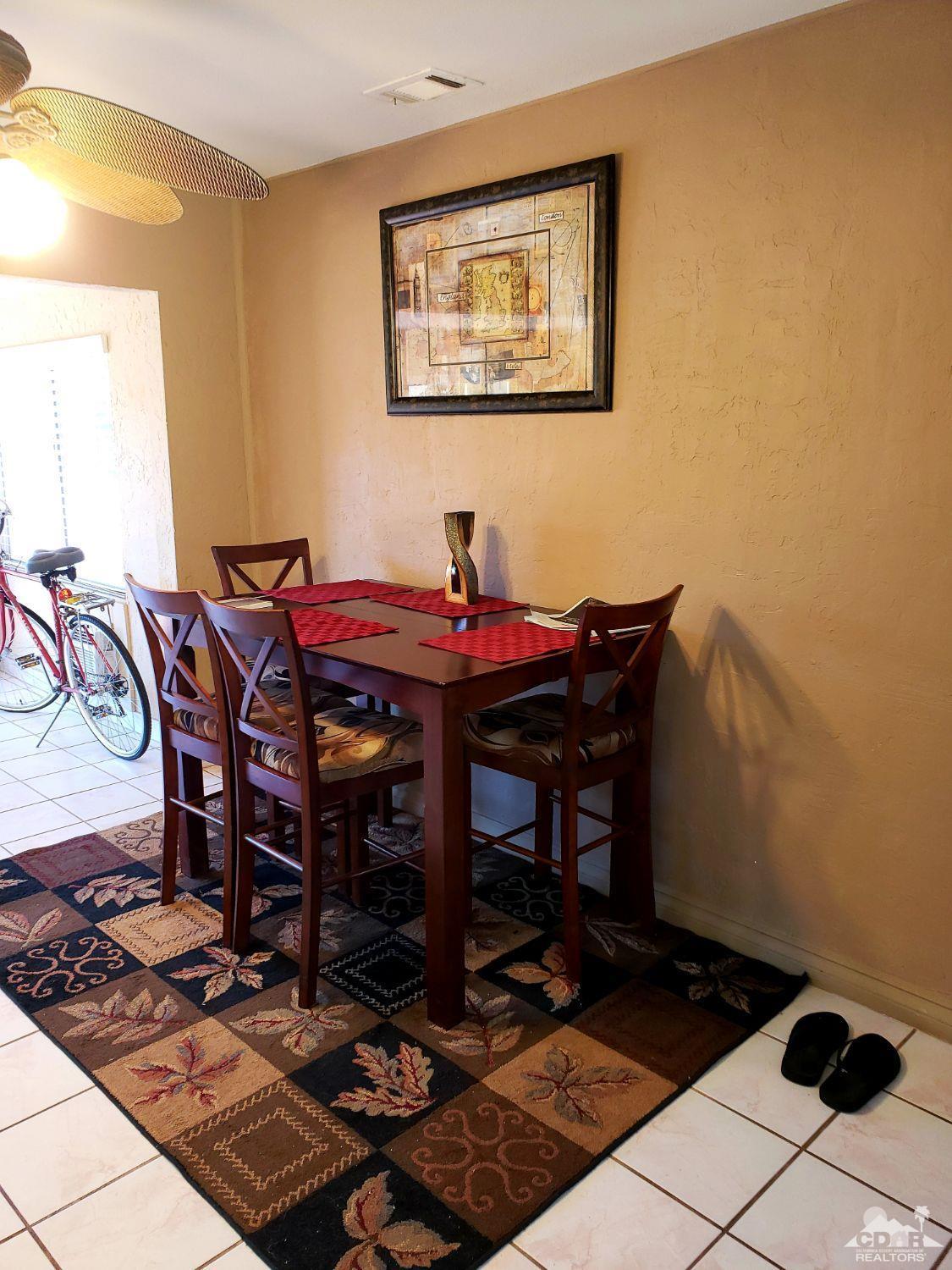 36883 Palmdale Road Rancho Mirage, CA 92270 - Photo 5 of 13 a view of a workspace with furniture