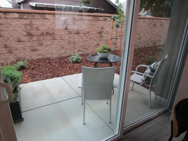 a view of bathroom with shower and plants