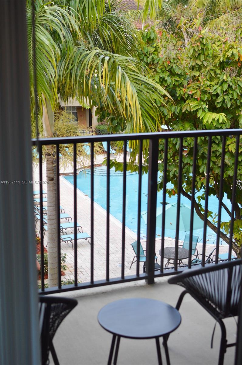 5840 West Sample Road, Unit 305 Coral Springs, FL 33067 - Photo 21 of 38 a view of a balcony
