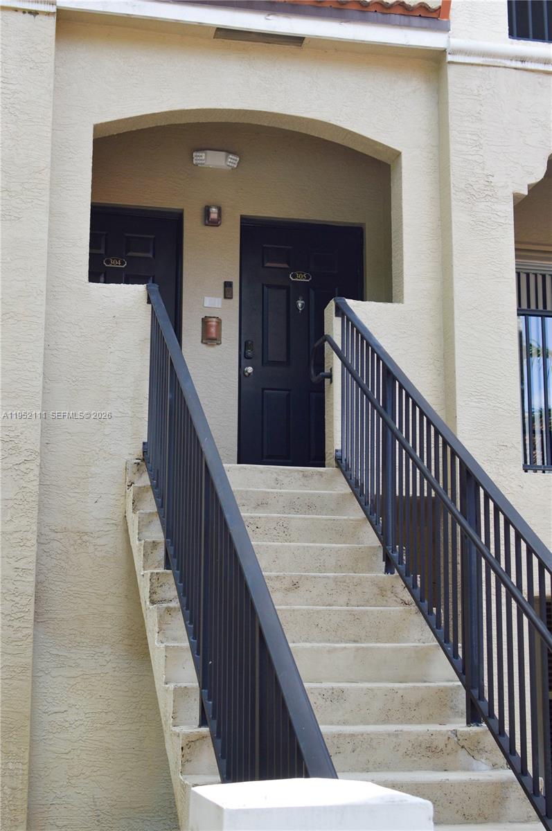 5840 West Sample Road, Unit 305 Coral Springs, FL 33067 - Photo 37 of 38 a view of a balcony