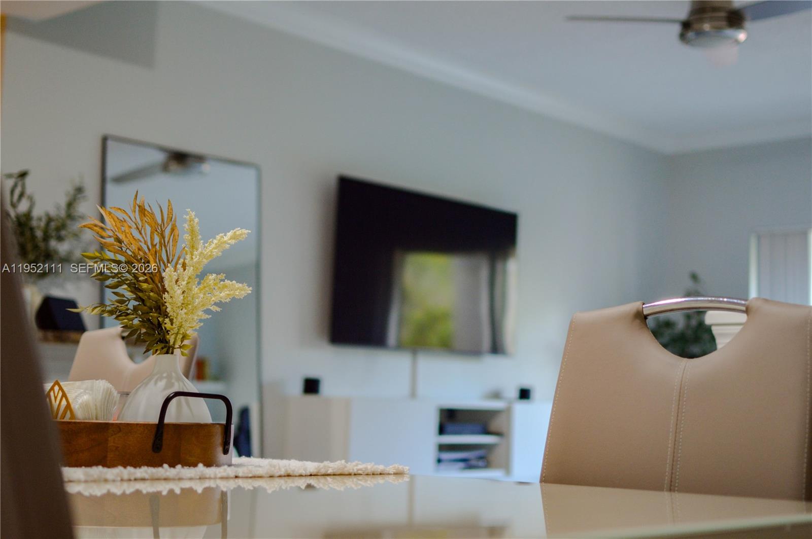 5840 West Sample Road, Unit 305 Coral Springs, FL 33067 - Photo 4 of 38 a bathroom with a sink and a mirror