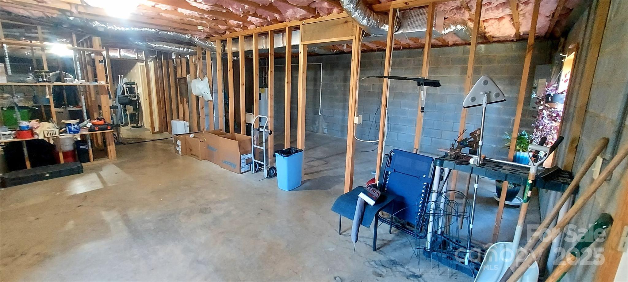 128 Ridgewood Way, Unit 208 Marion, NC 28752 - Photo 15 of 17 a view of a chairs with chandelier