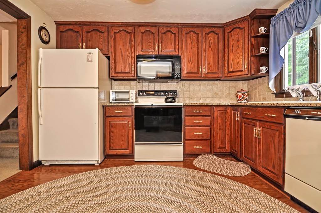 6 Joseph Road Mendon, MA 01756 - Photo 3 of 30 a kitchen with stainless steel appliances granite countertop a refrigerator stove a sink and dishwasher
