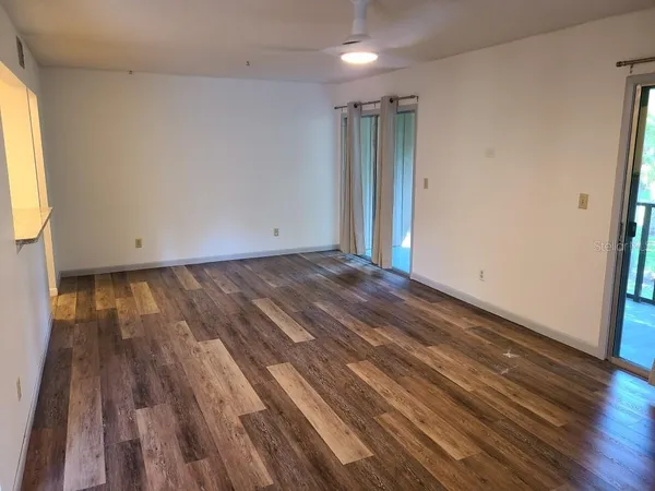 a view of front door with wooden floor