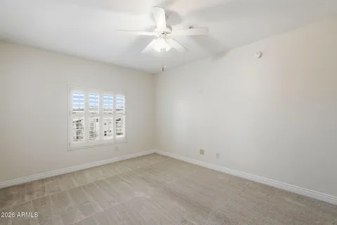 a view of a livingroom with a chandelier and a chandelier