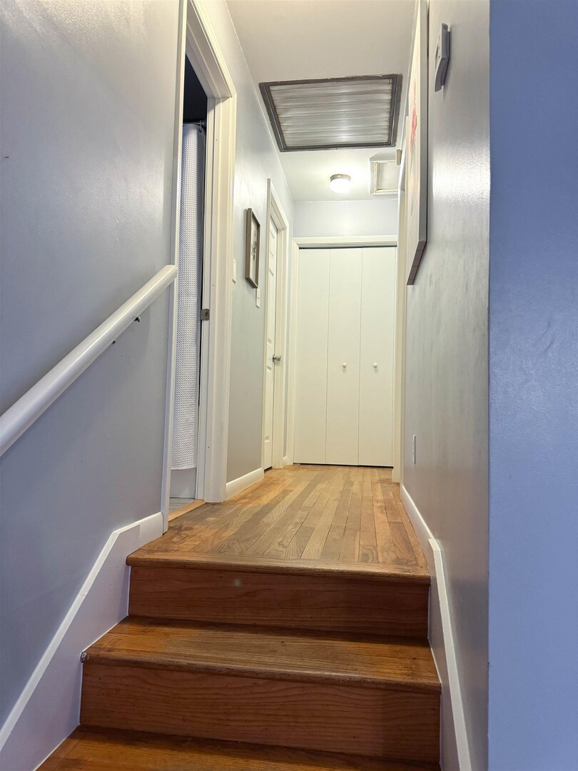 300 Williford Road Jonesboro, IL 62952 - Photo 24 of 34 Stairway with wood-type flooring