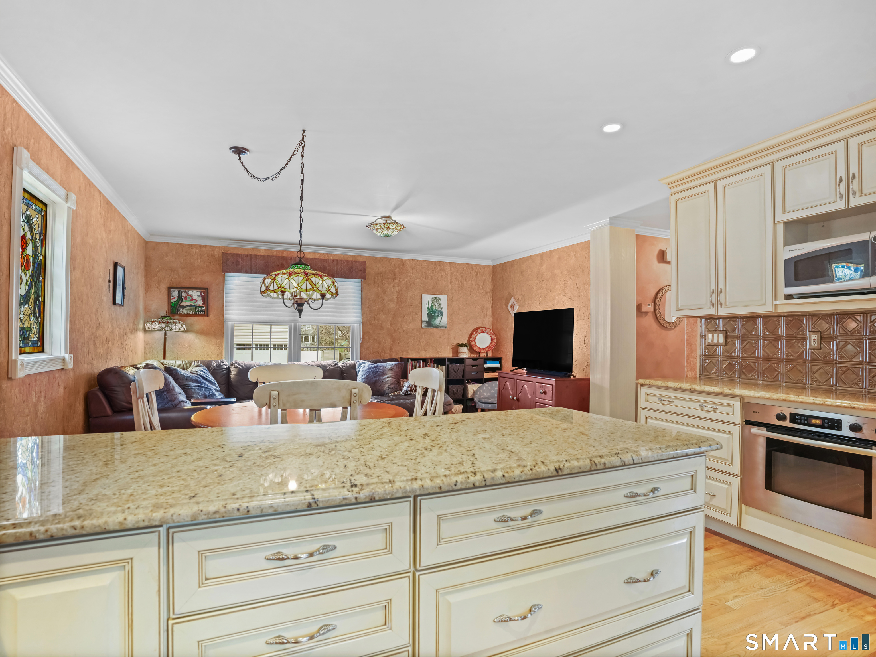82 Ramapoo Road Ridgefield, CT 06877 - Photo 12 of 40 View from the kitchen into the family room.