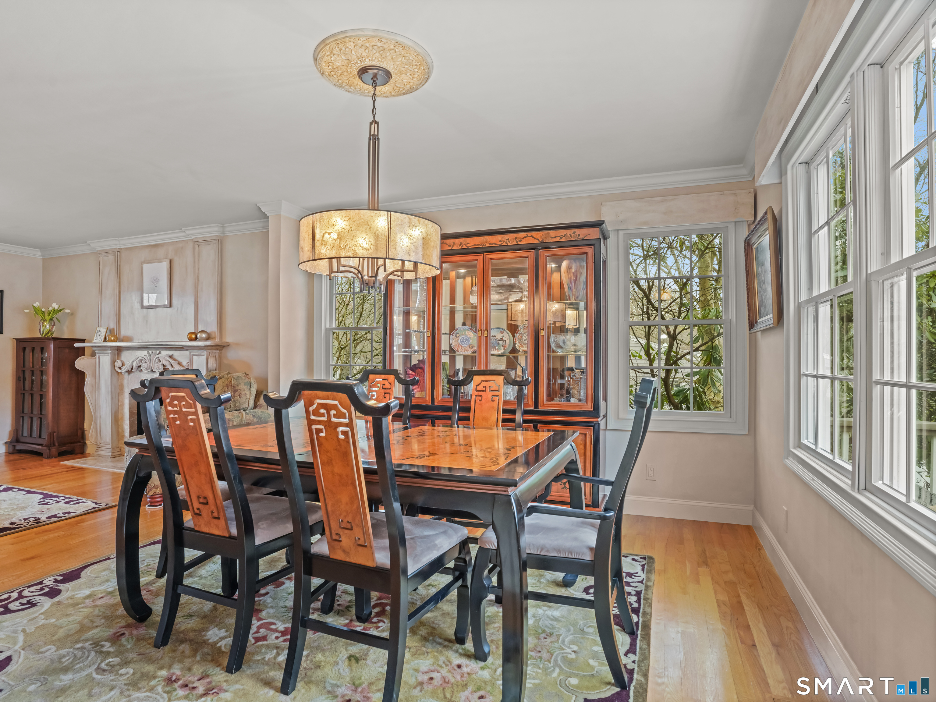 82 Ramapoo Road Ridgefield, CT 06877 - Photo 19 of 40 The dining room adjoins the living room and can fit another large extension for parties and holiday entertaining.