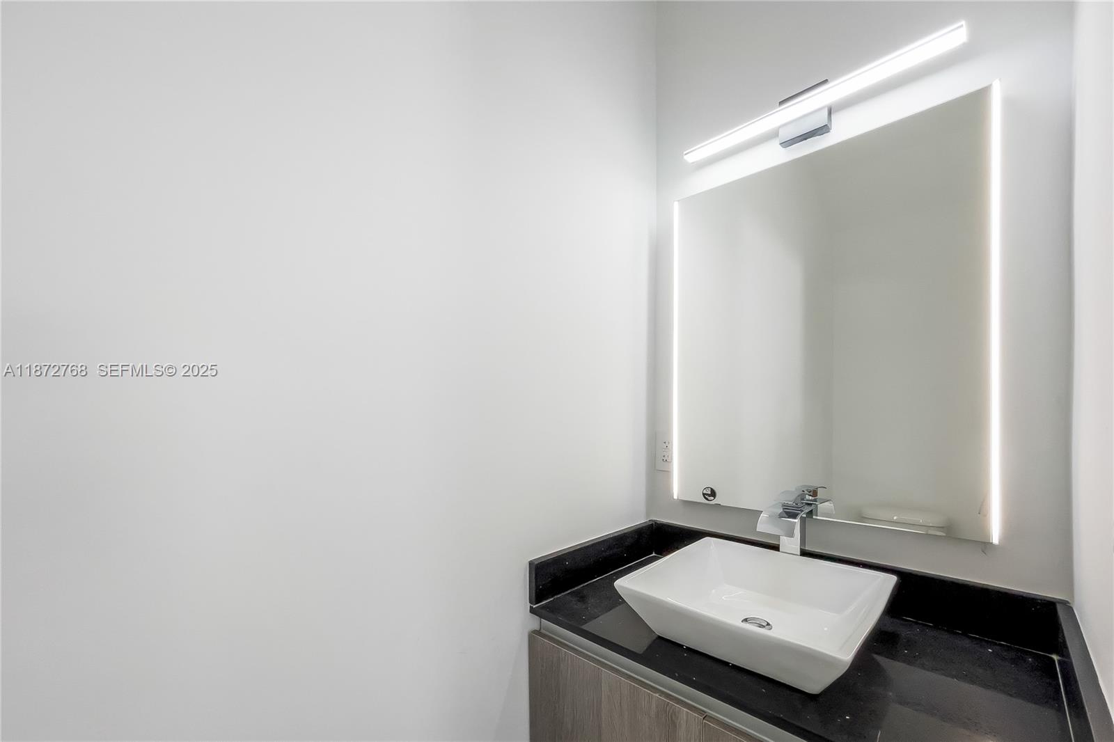 6159 Southwest 36th Court Miramar, FL 33023 - Photo 13 of 28 a bathroom with a sink and vanity