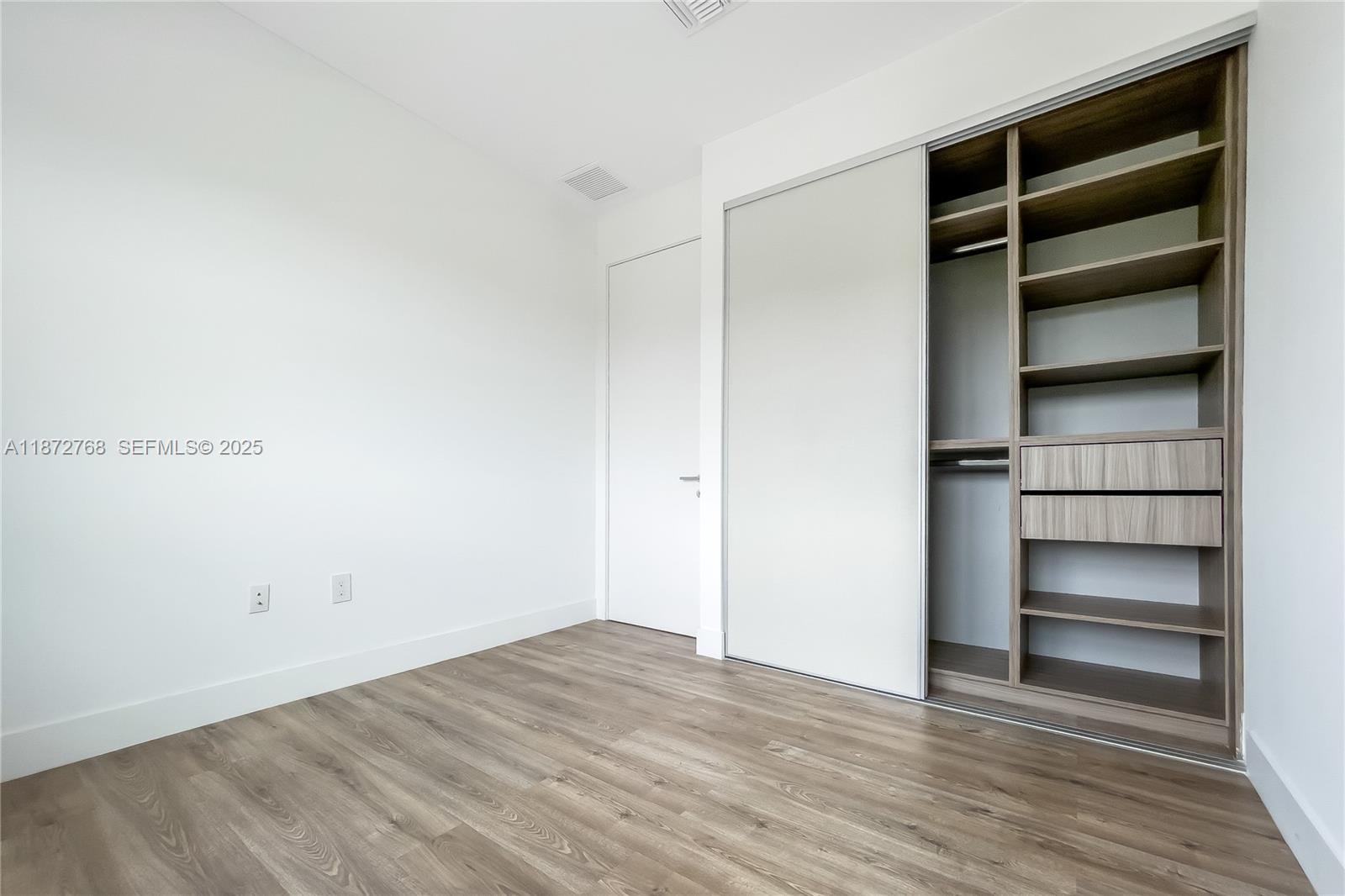 6159 Southwest 36th Court Miramar, FL 33023 - Photo 25 of 28 a view of an empty walk in closet
