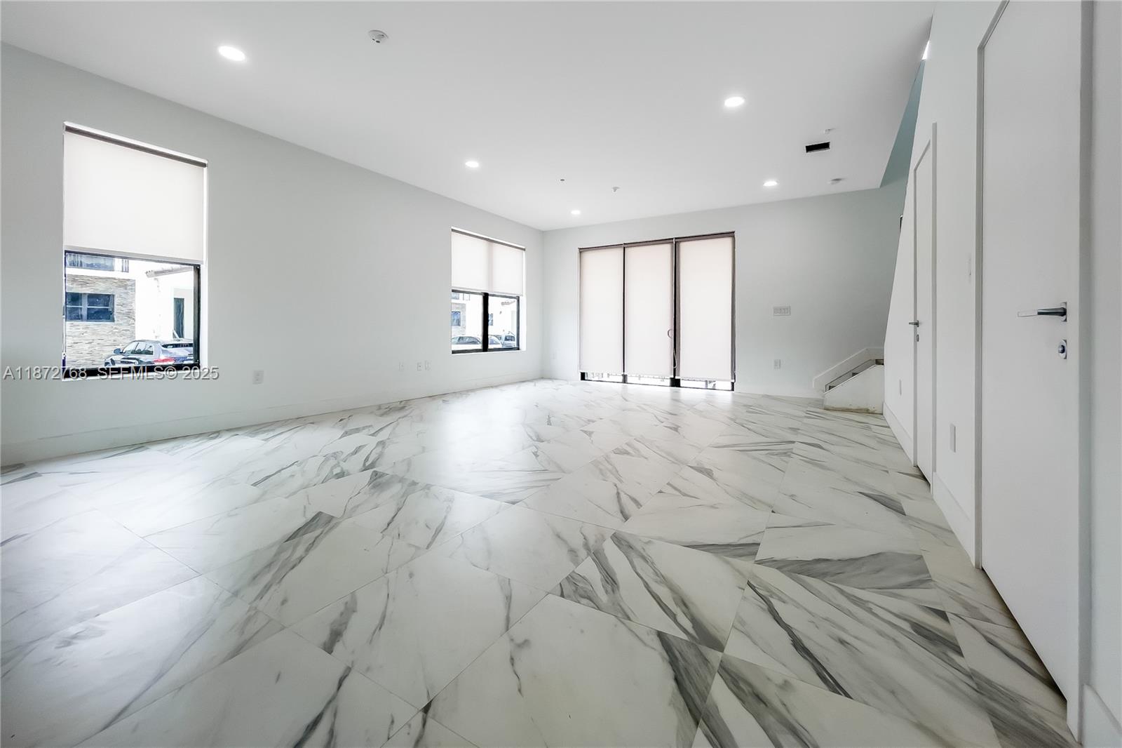 6159 Southwest 36th Court Miramar, FL 33023 - Photo 3 of 28 a view of an empty room and window