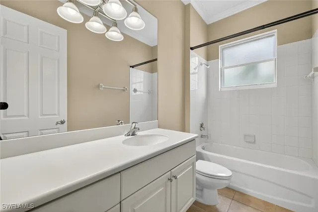 a bathroom with a sink a toilet and a bathtub