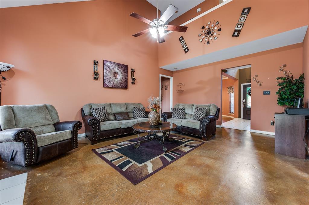 305 Ravenna Road Lake Dallas, TX 75065 - Photo 11 of 23 a living room with furniture rug and window