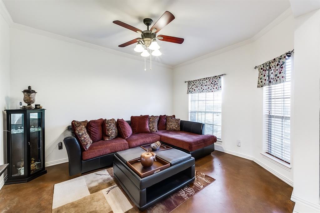 305 Ravenna Road Lake Dallas, TX 75065 - Photo 4 of 23 a living room with furniture and a window