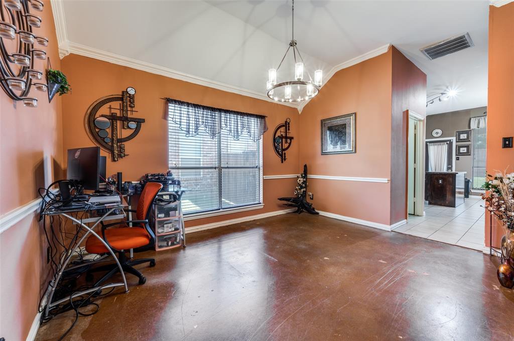 305 Ravenna Road Lake Dallas, TX 75065 - Photo 9 of 23 a view of a room with gym equipment