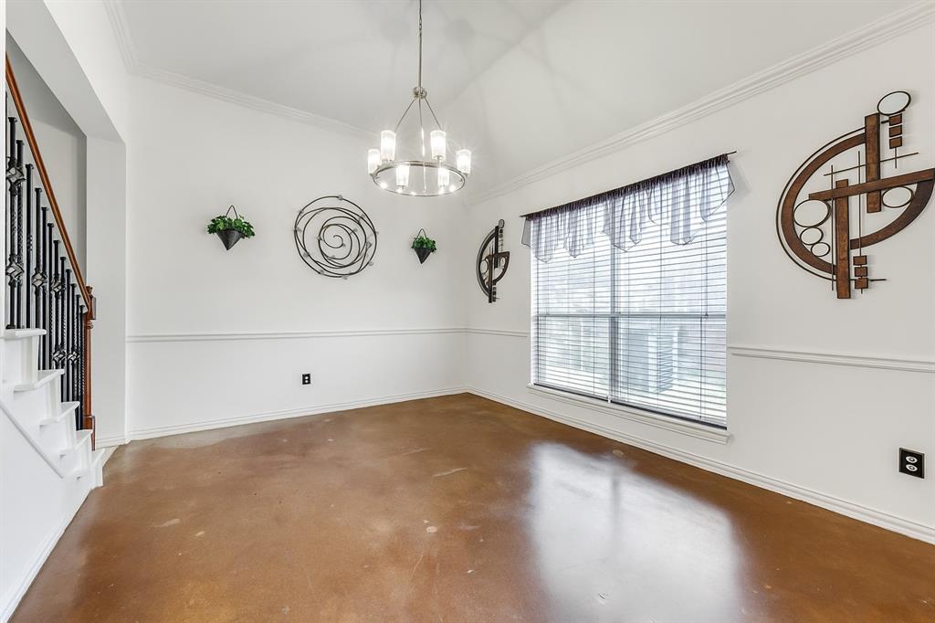 305 Ravenna Road Lake Dallas, TX 75065 - Photo 10 of 23 a view of an empty room with window wooden floor and door