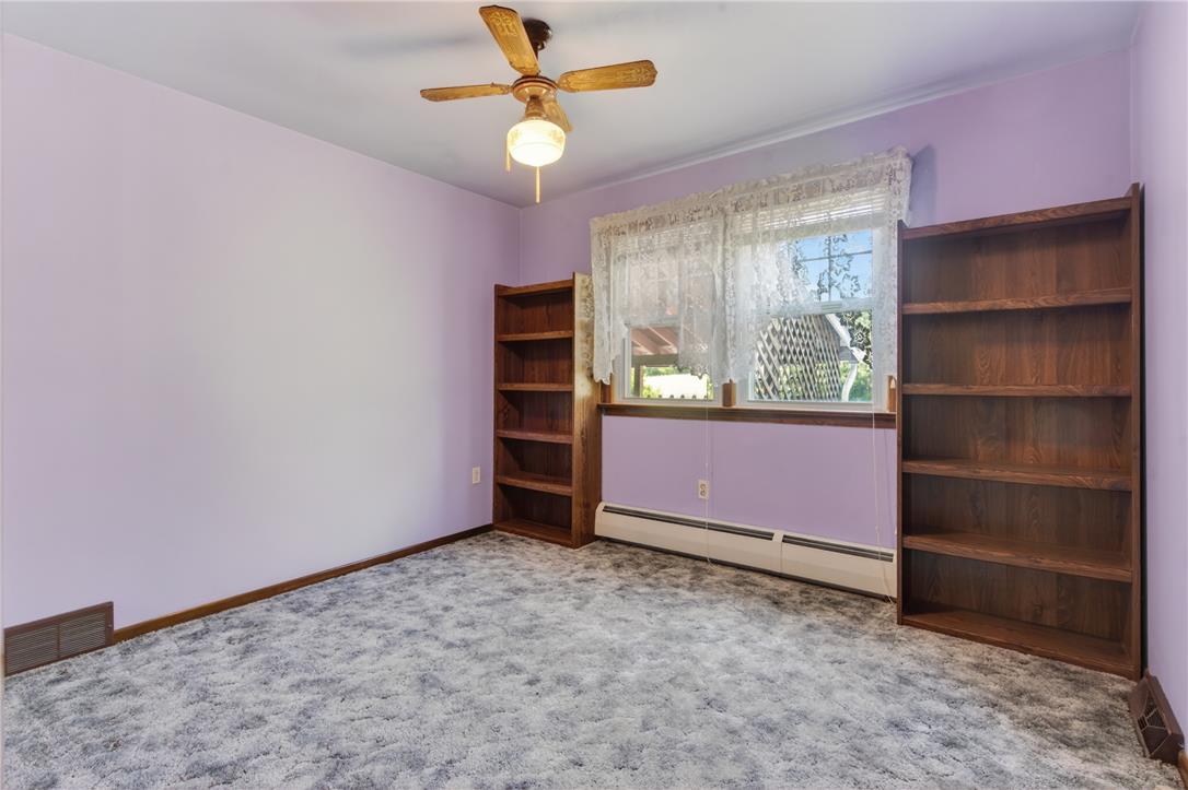62 Stoney Road Tamaqua, PA 18252 - Photo 34 of 61 A well-lit bedroom features plush carpeting and convenient built-in shelving.
