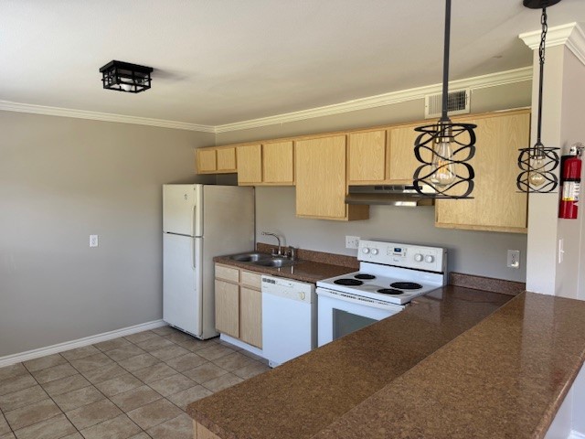 3620 Southmore Boulevard, Unit 11 Houston, TX 77004 - Photo 5 of 15 a kitchen with stainless steel appliances granite countertop a sink a stove and a refrigerator