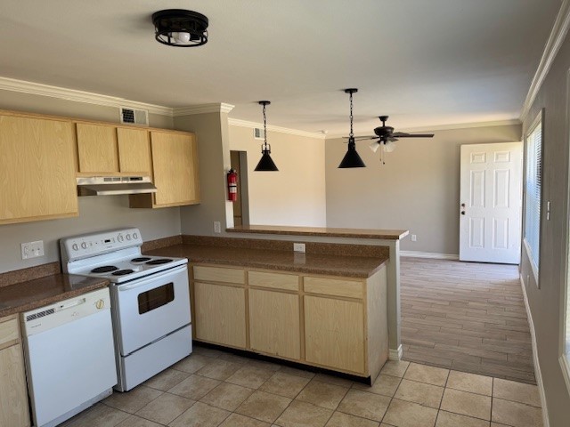 3620 Southmore Boulevard, Unit 11 Houston, TX 77004 - Photo 7 of 15 a kitchen with white cabinets and white appliances