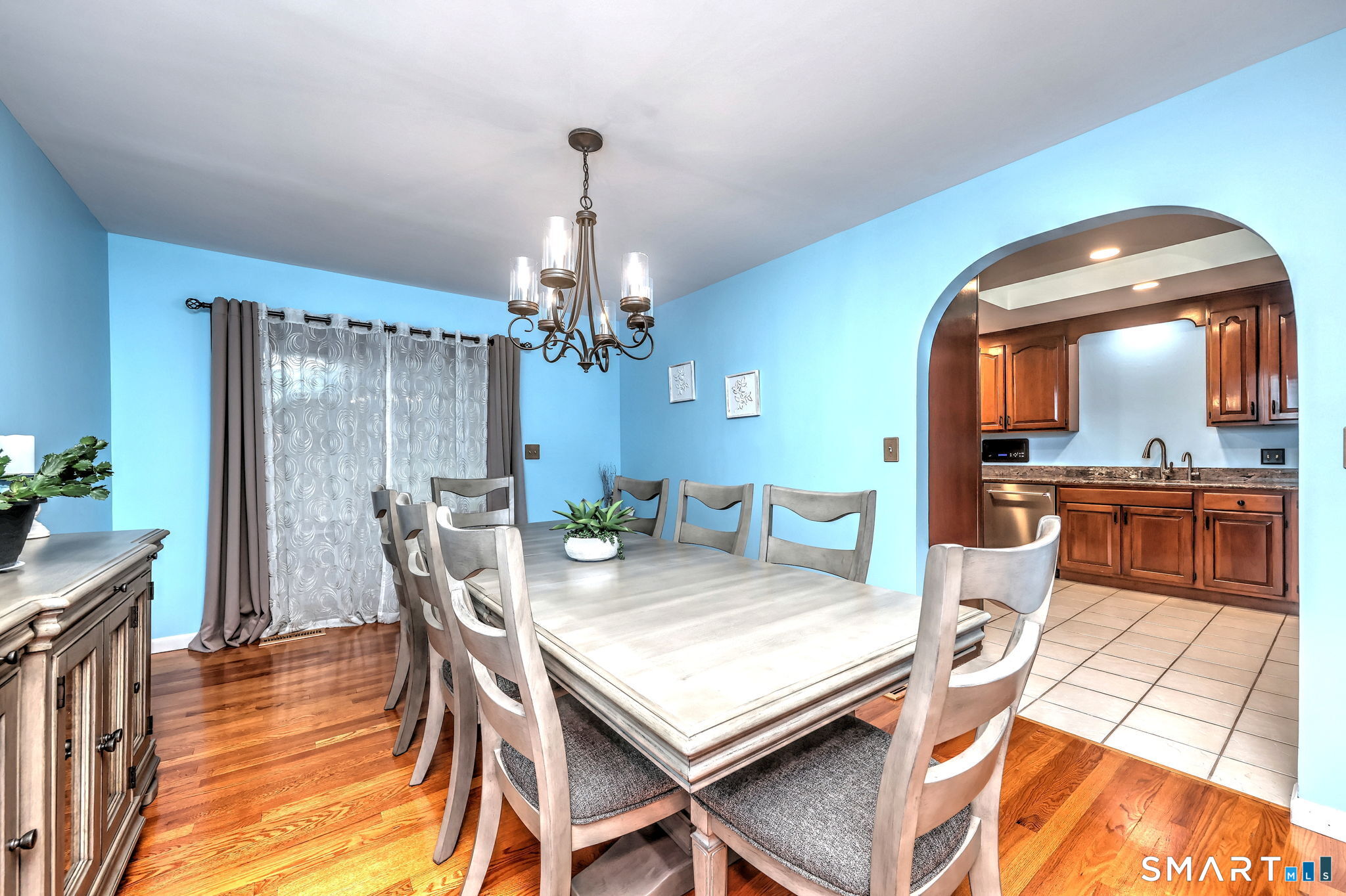 2262 Ridge Road North Haven, CT 06473 - Photo 27 of 40 a view of a dining room with furniture and wooden floor