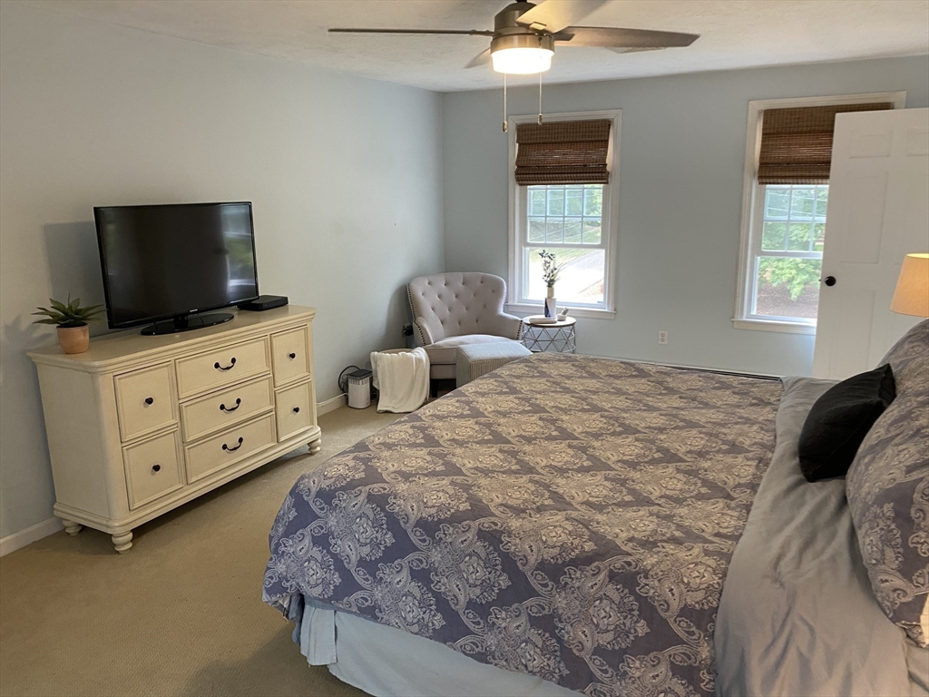 3 Pheasanthill Road Norfolk, MA 02056 - Photo 17 of 32 a bedroom with a bed and flat screen tv