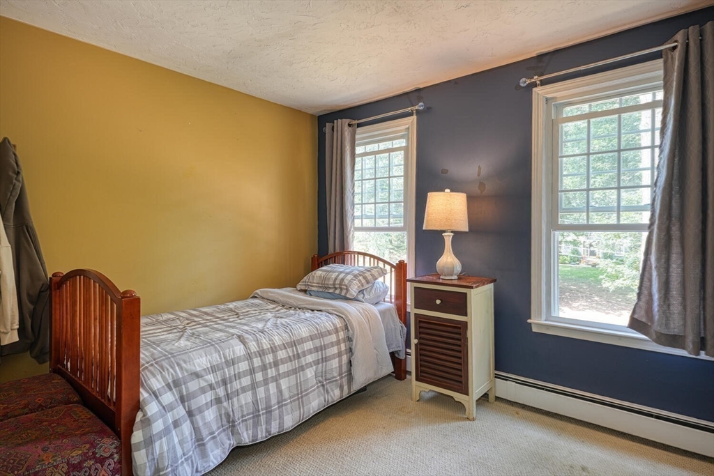 3 Pheasanthill Road Norfolk, MA 02056 - Photo 19 of 32 a bedroom with a bed and a window