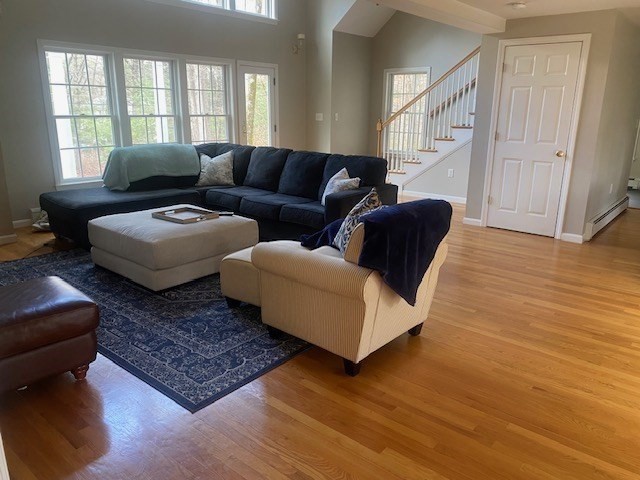 3 Pheasanthill Road Norfolk, MA 02056 - Photo 8 of 32 a living room with furniture and a rug