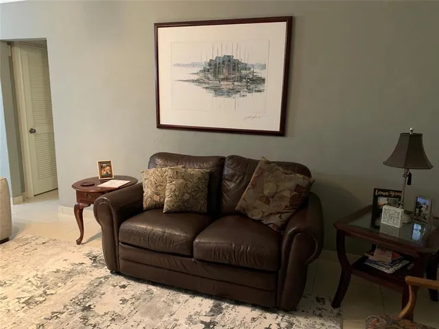 a couch sitting in a living room with a couch