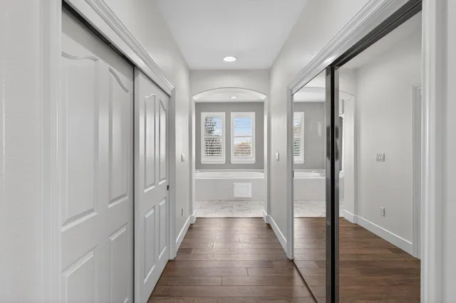 an aerial view of a house with a swimming pool