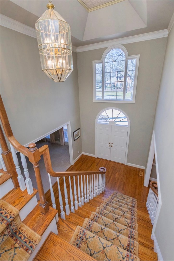 1104 Thornehill Drive Anderson, SC 29621 - Photo 13 of 35 This spacious foyer features a grand staircase, natural light, and a large front entrance.