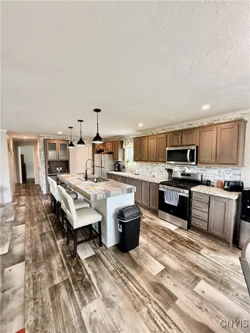 $419,000 | 7023 River Road, Aurelius, NY 13034