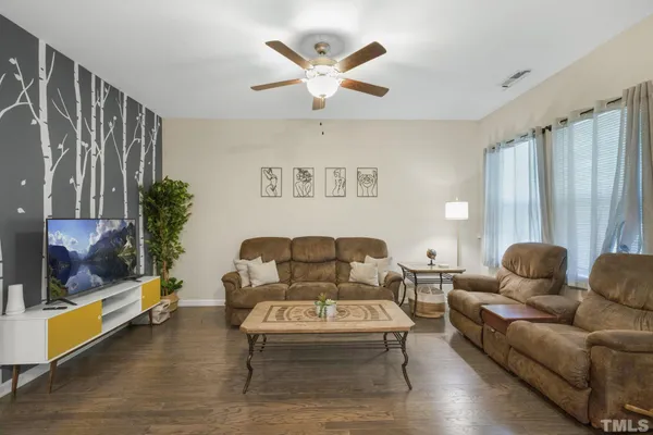 a living room with furniture and window