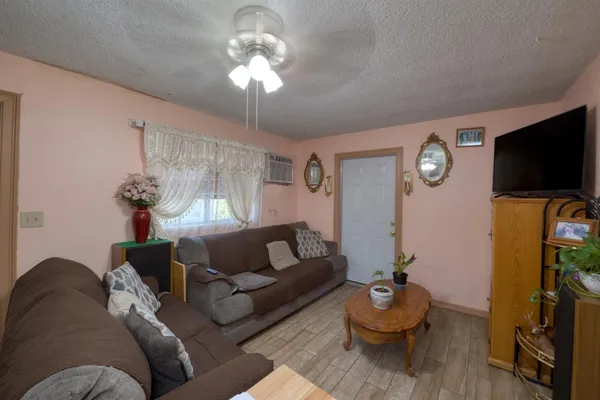 a room with furniture and workspace