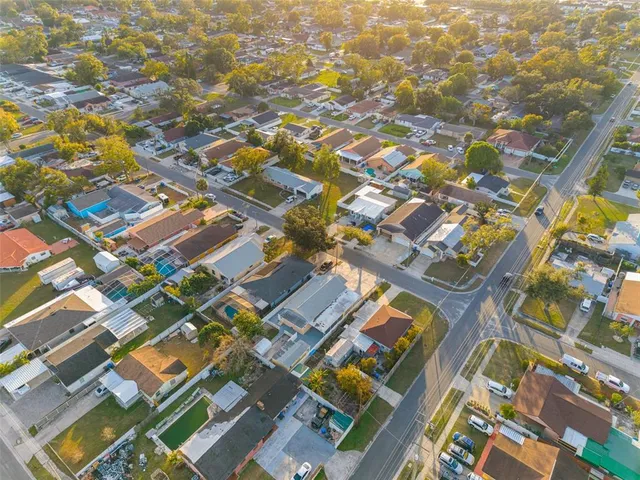 an aerial view of residential building with parking space