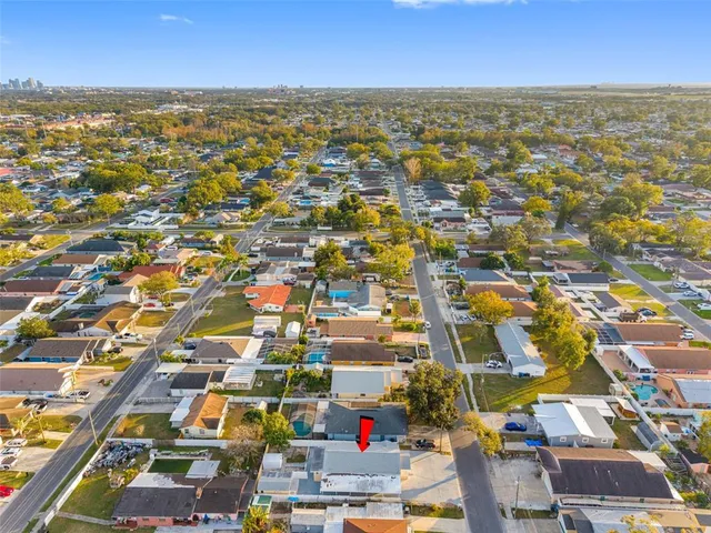an aerial view of residential building with parking space