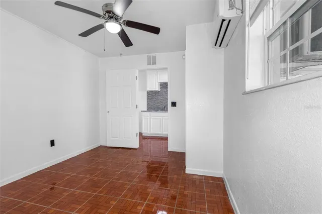 a view of a hallway with staircase