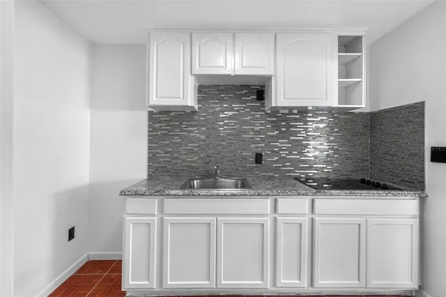 a bathroom with a toilet a sink and a bathtub