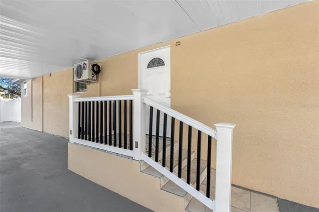 a view of a kitchen with a sink and a ceiling fan