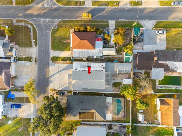 a aerial view of multi story residential apartment building with outdoor space