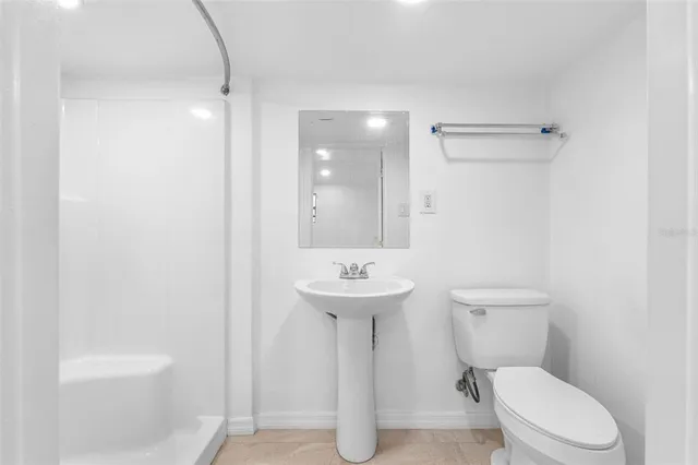 a kitchen with stainless steel appliances a refrigerator and a sink