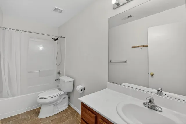 a kitchen with stainless steel appliances granite countertop a sink stove microwave and cabinets