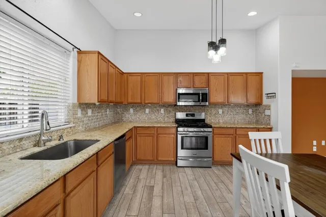 a view of a backyard with palm tree