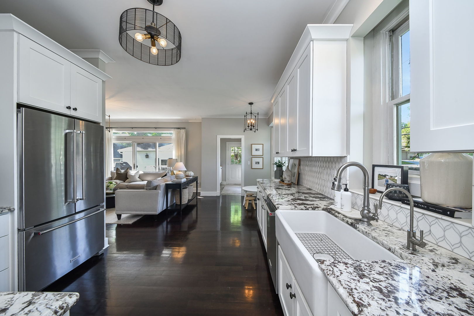 426 Elm Street Batavia, IL 60510 - Photo 9 of 34 a kitchen with stainless steel appliances granite countertop a sink refrigerator stove and microwave