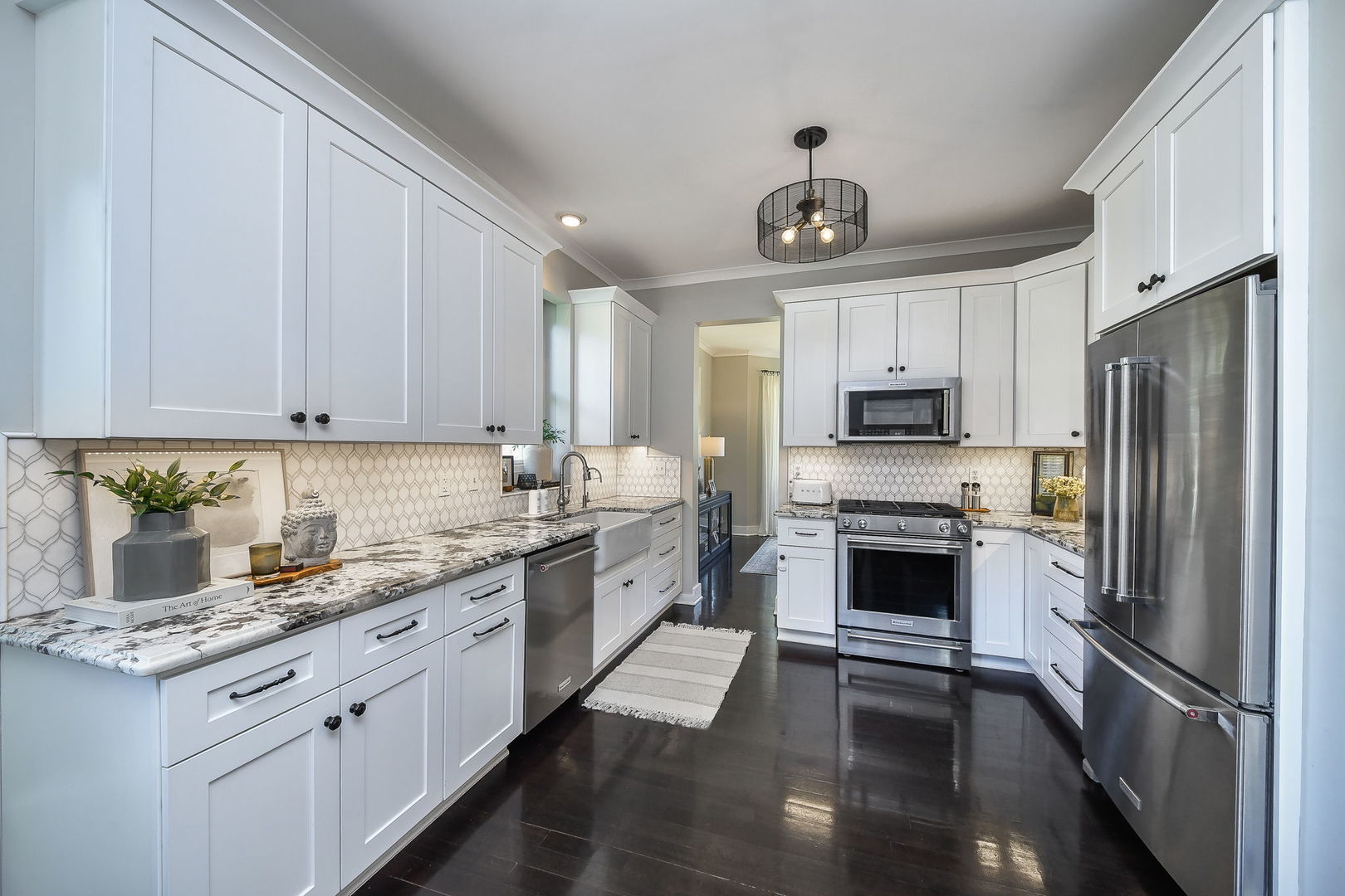 426 Elm Street Batavia, IL 60510 - Photo 10 of 34 a kitchen with granite countertop stainless steel appliances a stove refrigerator and cabinets