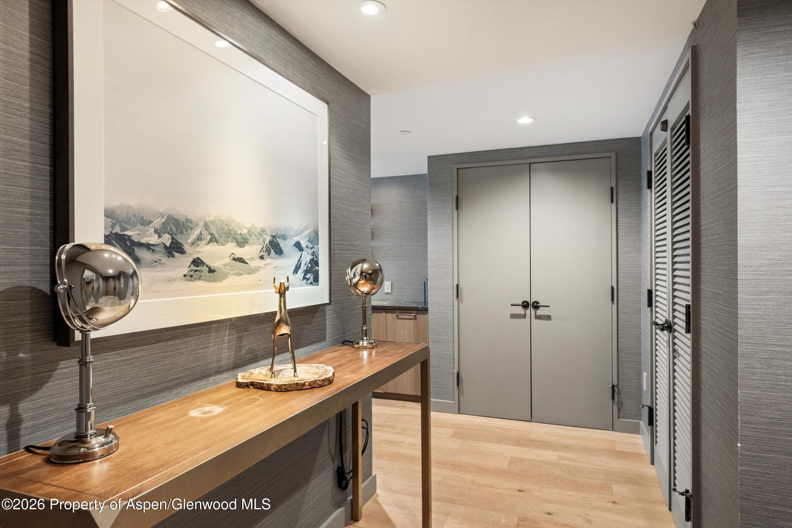 130 Wood Road, Unit 701/801 Snowmass Village, CO 81615 - Photo 13 of 41 a bathroom with a sink a mirror and shower