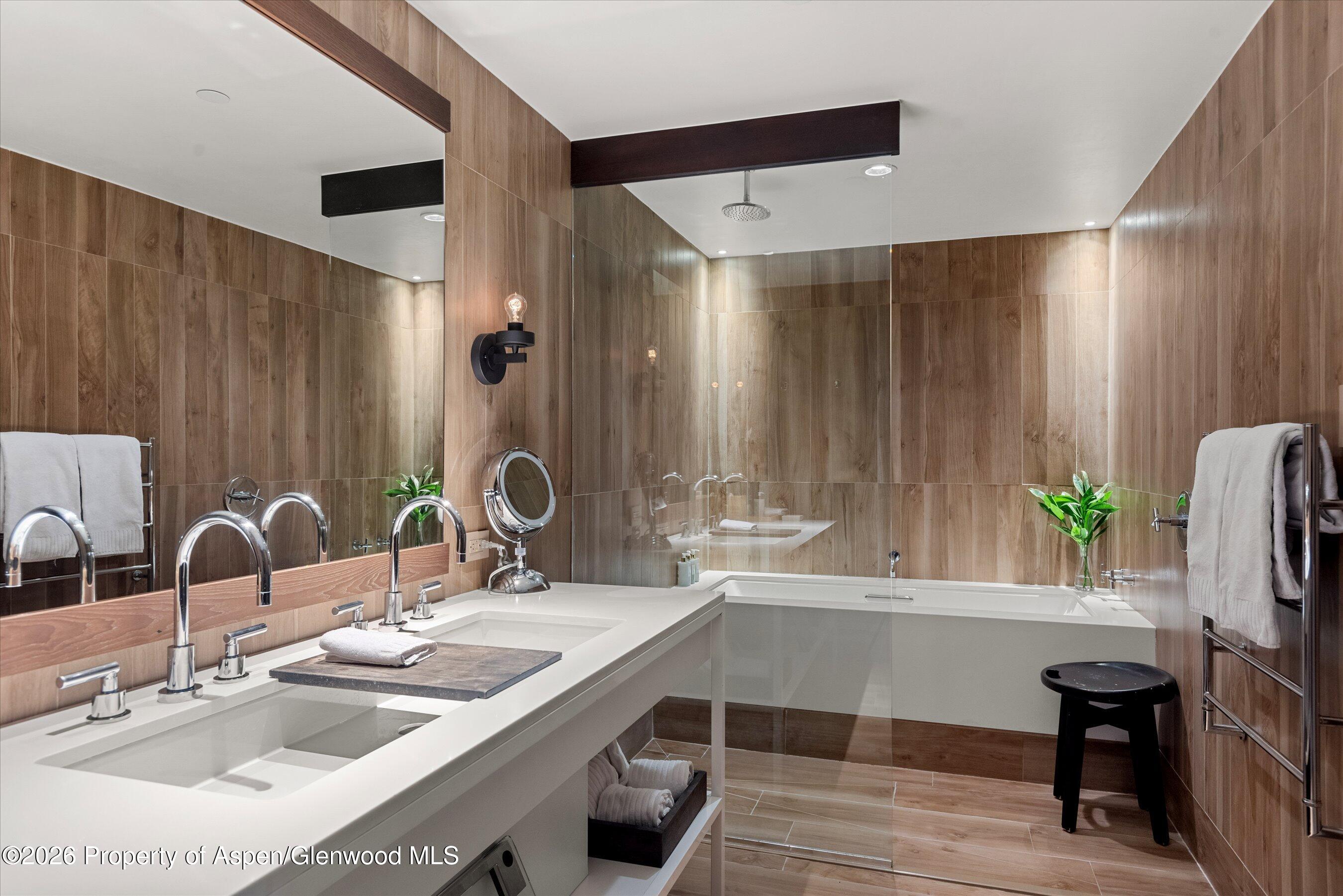 130 Wood Road, Unit 701/801 Snowmass Village, CO 81615 - Photo 20 of 41 a bathroom with a sink and a mirror