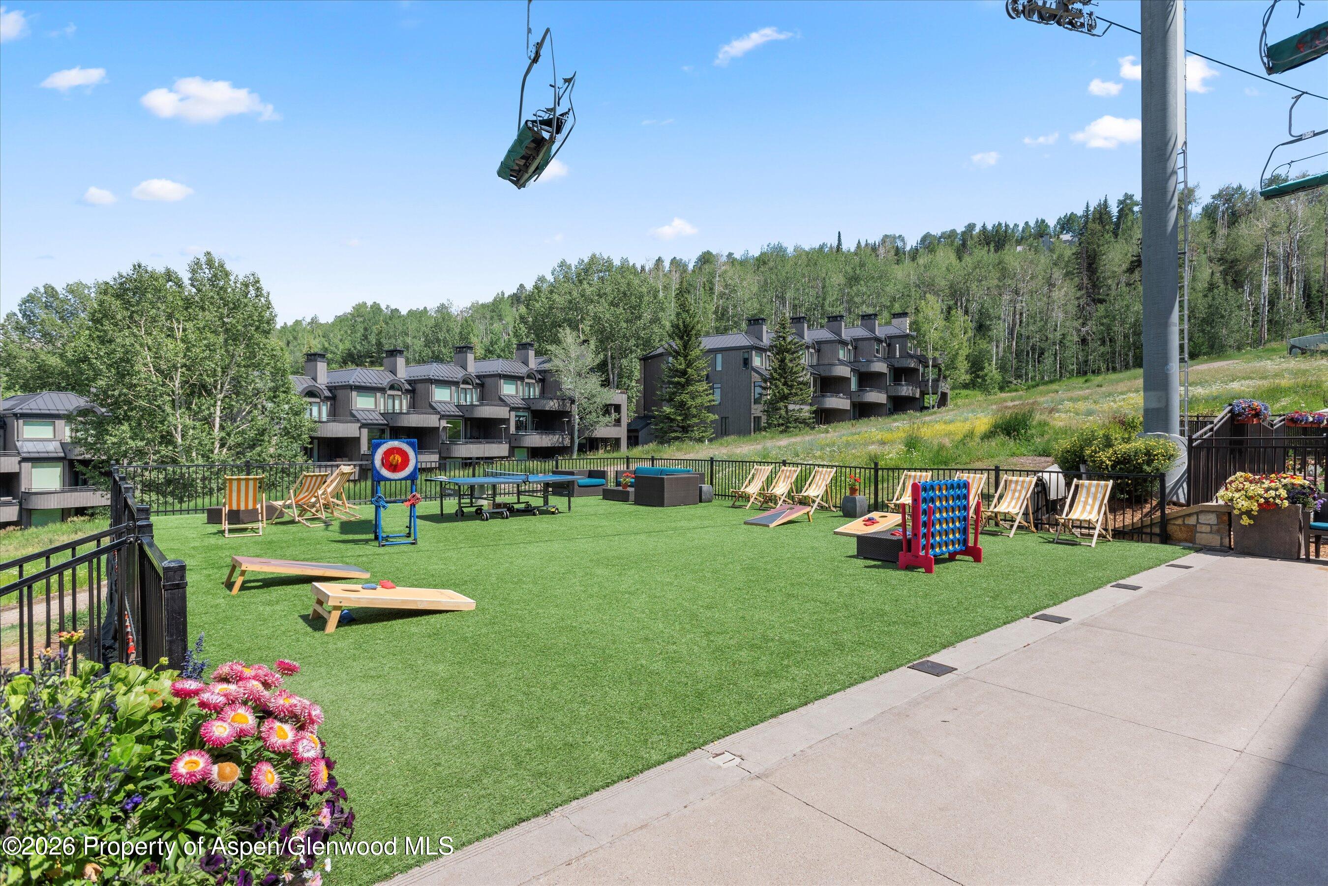130 Wood Road, Unit 701/801 Snowmass Village, CO 81615 - Photo 34 of 41 a childrens park with lots of swings and slides