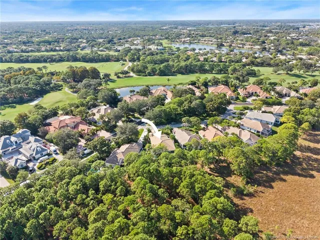 a view of a city with mountains in the background