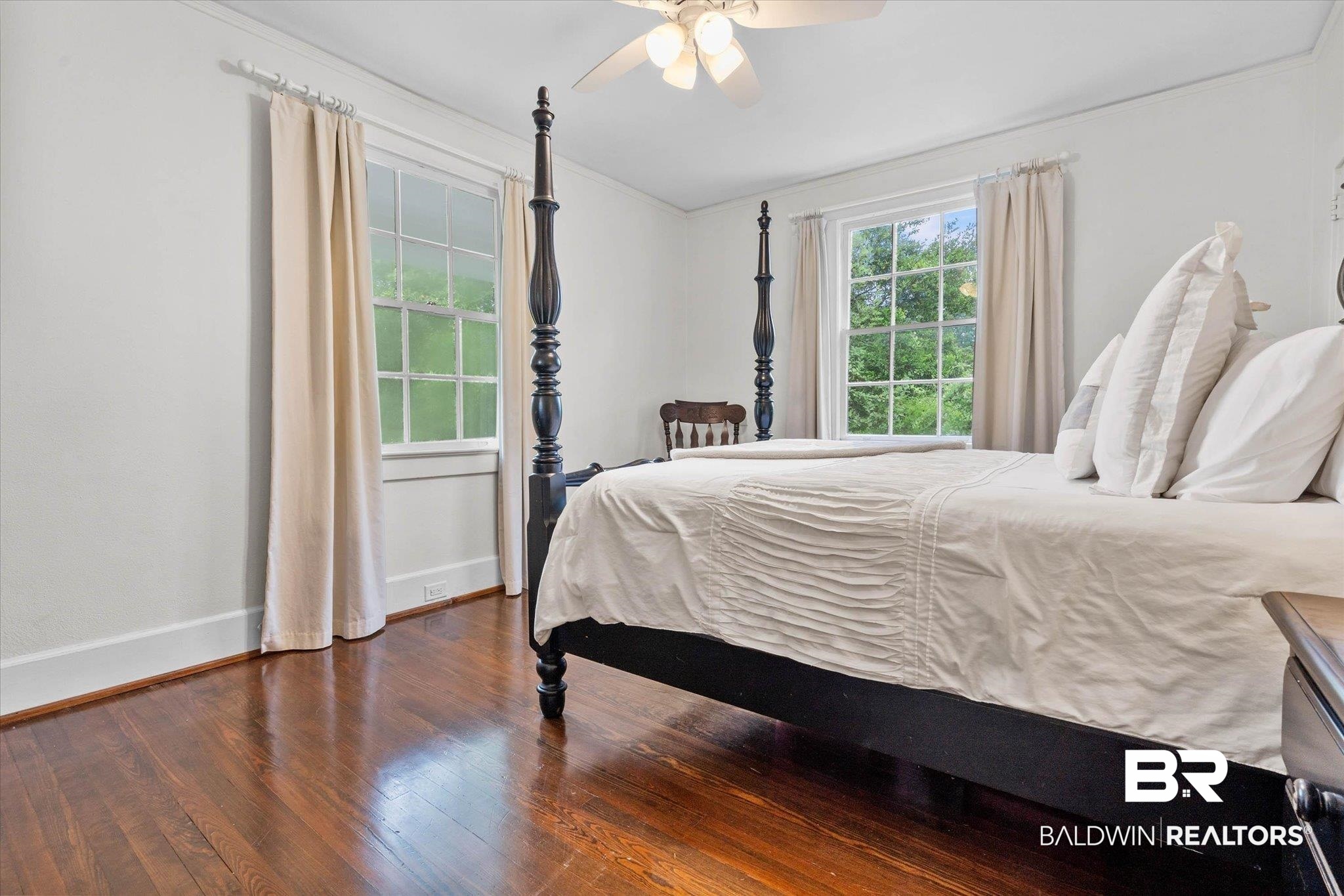 3863 Old Shell Road Mobile, AL 36608 - Photo 30 of 48 Spacious room featuring rich wood-finish flooring, white walls, and a ceiling fan