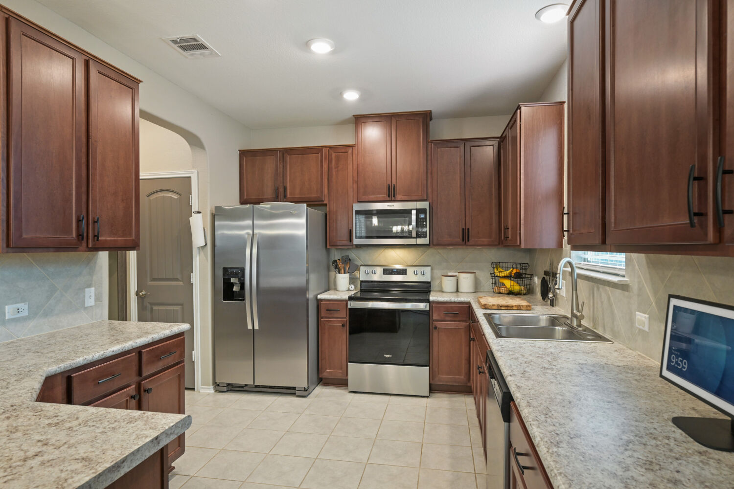 175 Gustaf Trail Kyle, TX 78640 - Photo 5 of 28 Beautiful kitchen w/ granite counterops and stainless steel appliances